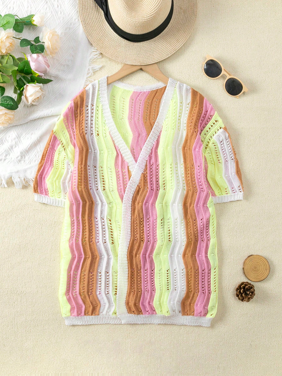 Girls colorful stripe crochet swimwear cover up featuring a button front design and half sleeves for vacation and beach wear.