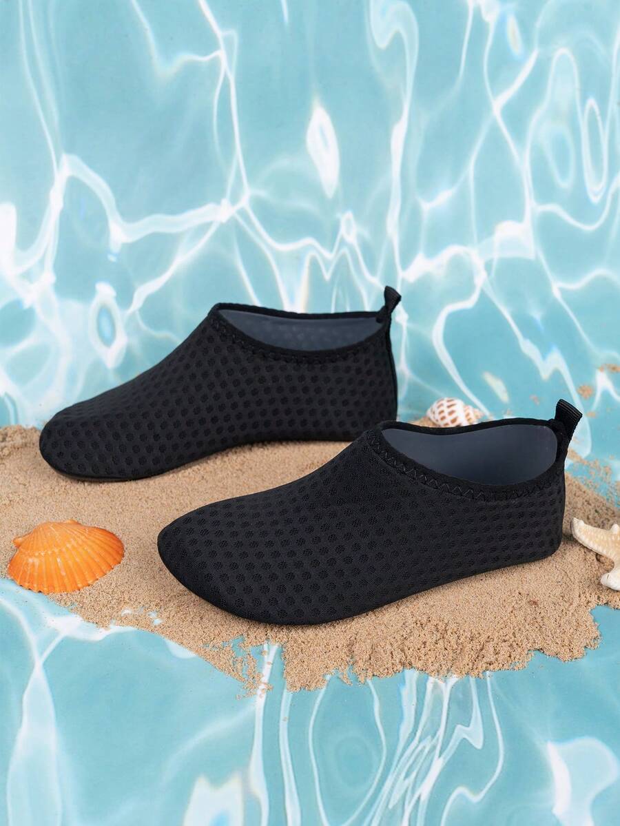 Boys black plain aqua socks featuring a slip-on rib-knit design, breathable fabric upper, mesh insole, and non-slip TPR outsole.