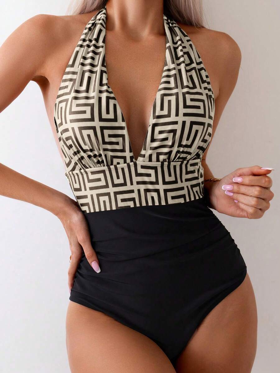 Apricot women's one-piece swimsuit featuring a halter neckline, backless tie-back detail, and ruched knitted fabric.