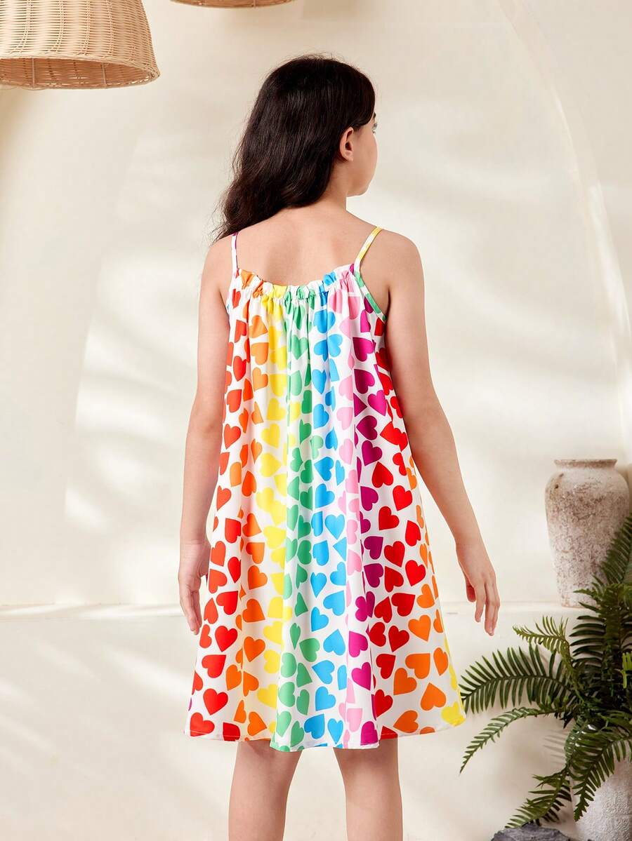Multicolor geometric print cami midi dress for tween girls featuring spaghetti straps and a flared hem.