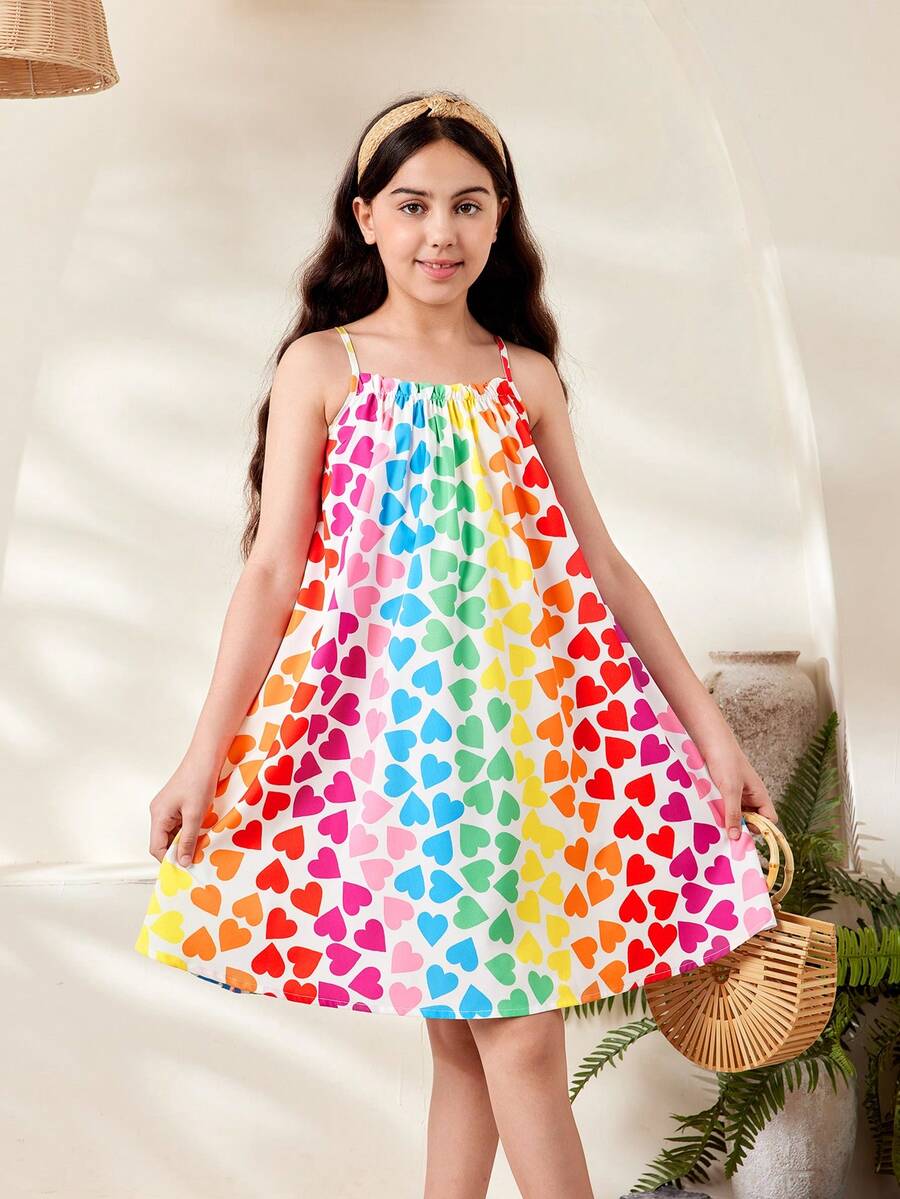 Multicolor geometric print cami midi dress for tween girls featuring spaghetti straps and a flared hem.