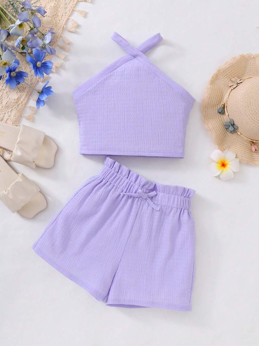 Tween girl 2-piece casual outfit set featuring a solid beige knit halter sleeveless top with belted detail and matching shorts.