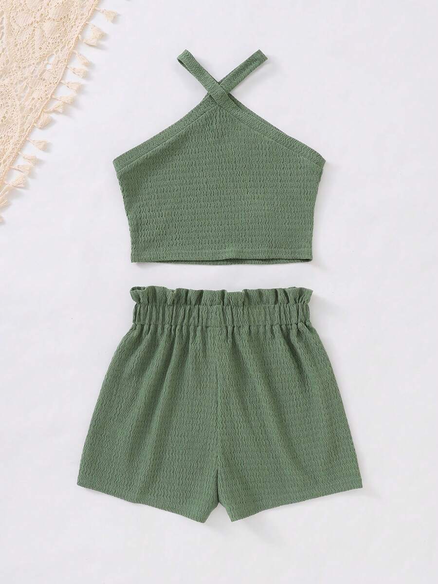 Tween girl 2-piece casual outfit set featuring a solid beige knit halter sleeveless top with belted detail and matching shorts.