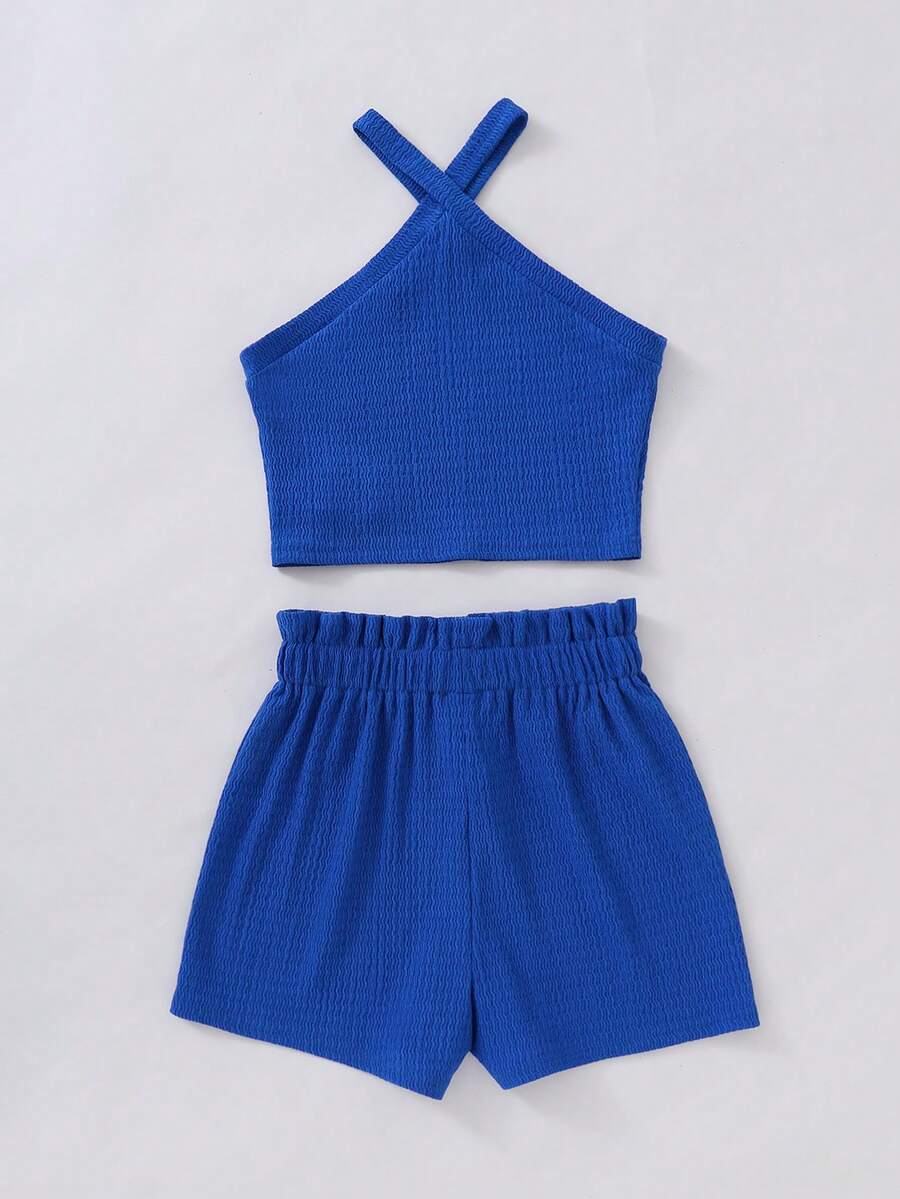 Tween girl 2-piece casual outfit set featuring a solid beige knit halter sleeveless top with belted detail and matching shorts.