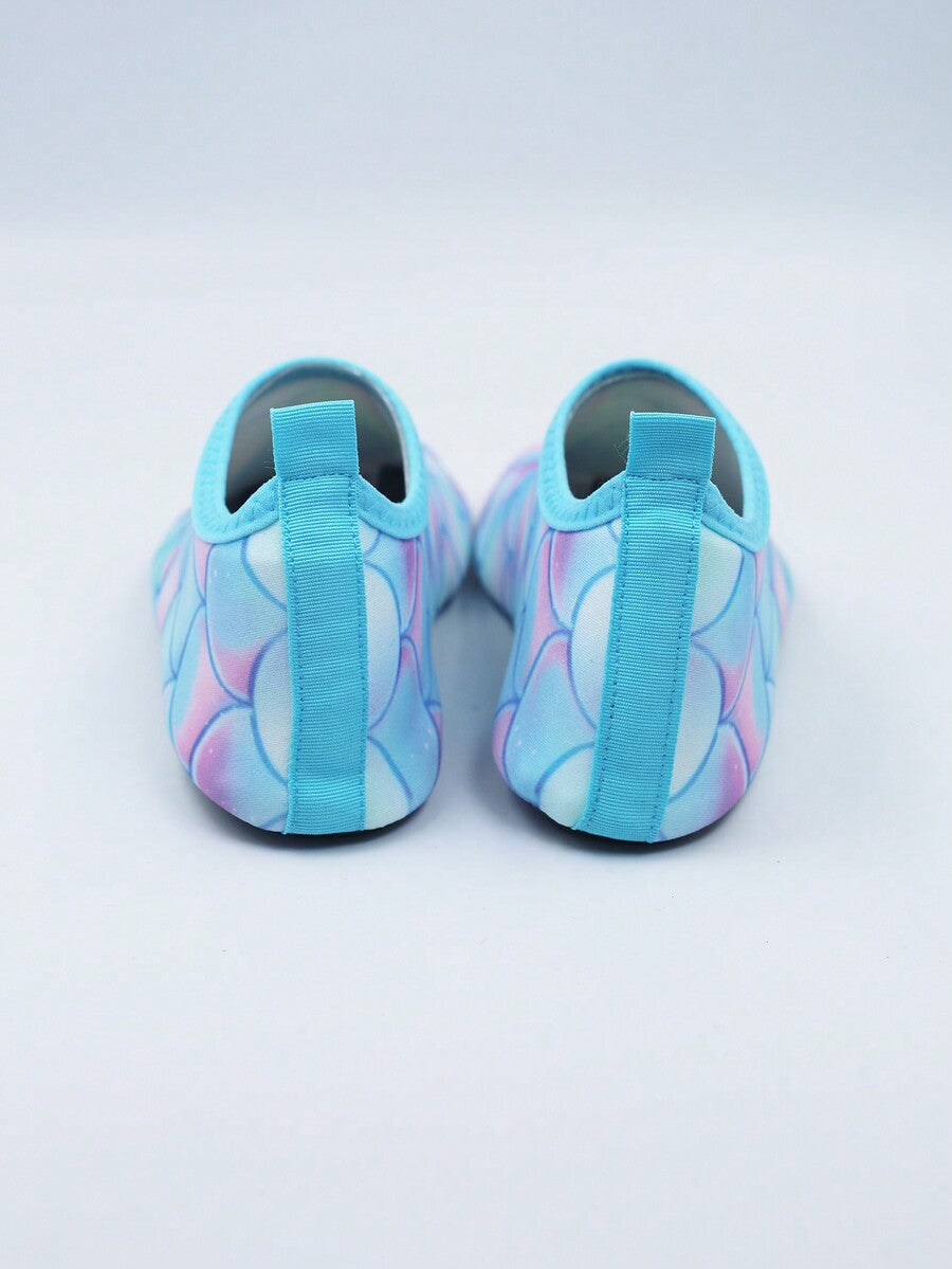 Multicolor kids slip-on water shoes with breathable Lycra upper and non-slip TPR outsole for boys and girls.