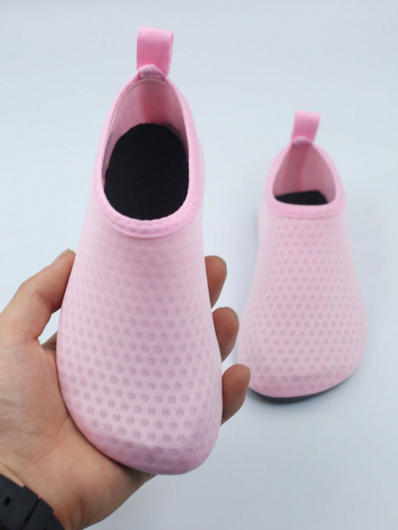 Kids slip-on aqua socks featuring geometric pattern, breathable Lycra upper, and non-slip TPR outsole for beach and water activities.