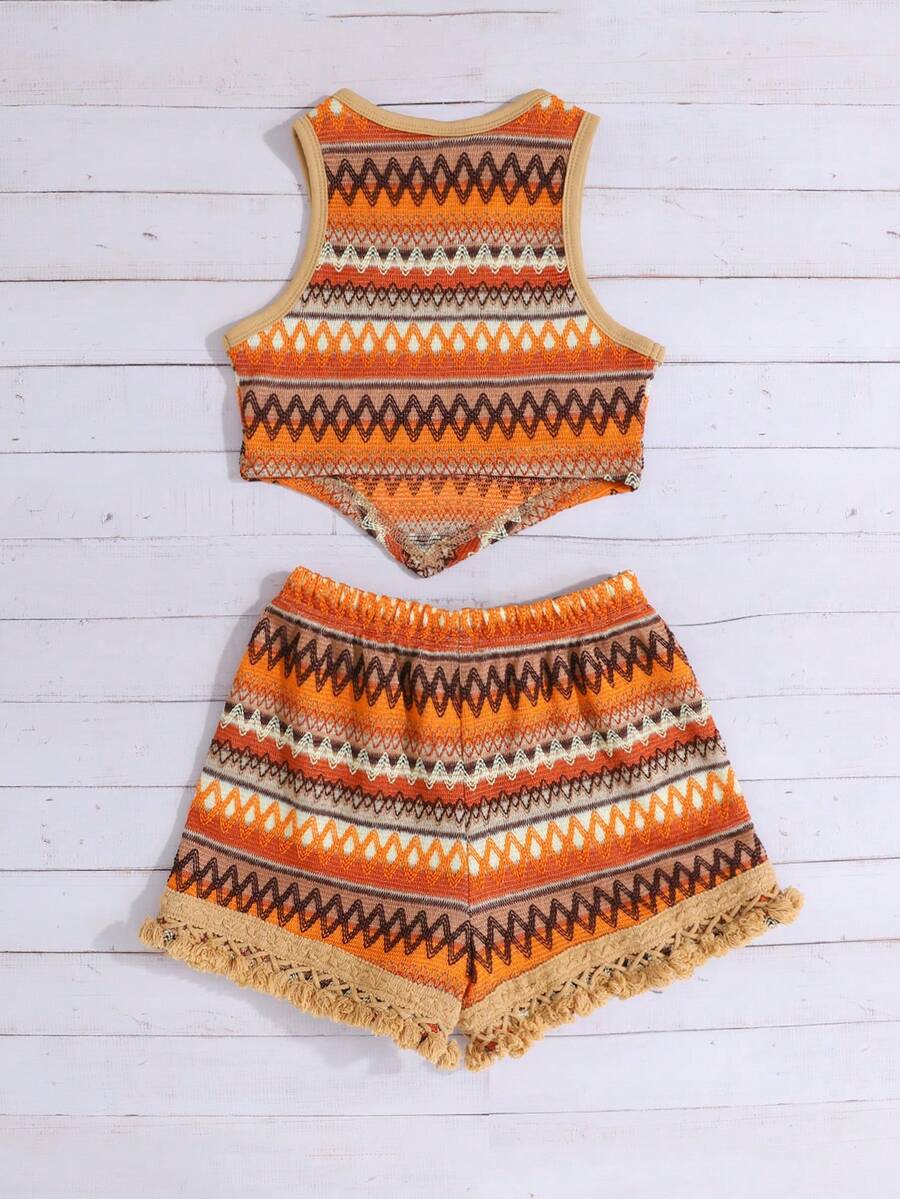 Tween girl wearing a blue boho sleeveless round neck tank top and matching printed shorts set with cable knit detailing.