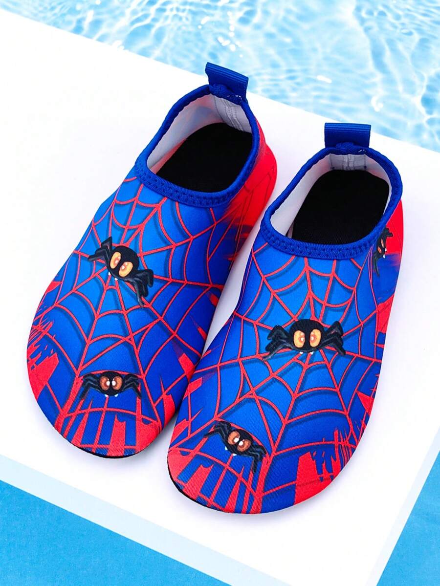 Red slip-on boys water shoes featuring a breathable fabric upper with contrast binding and a durable TPR outsole.
