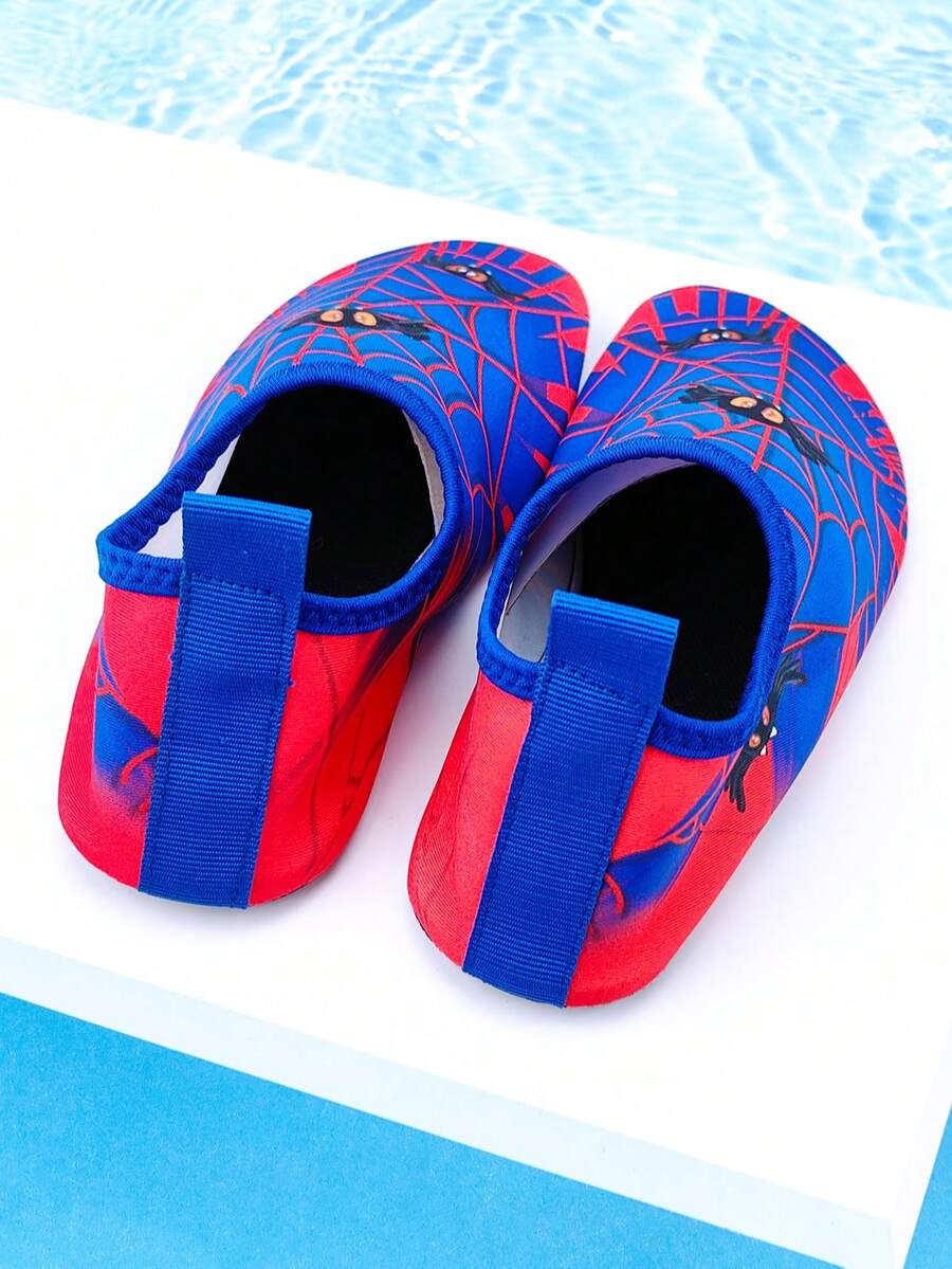 Red slip-on boys water shoes featuring a breathable fabric upper with contrast binding and a durable TPR outsole.