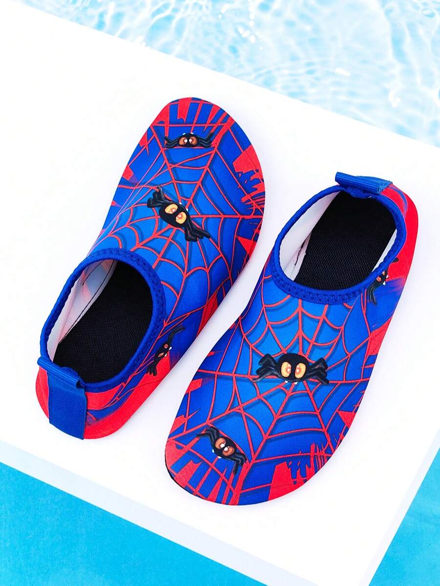 Red slip-on boys water shoes featuring a breathable fabric upper with contrast binding and a durable TPR outsole.
