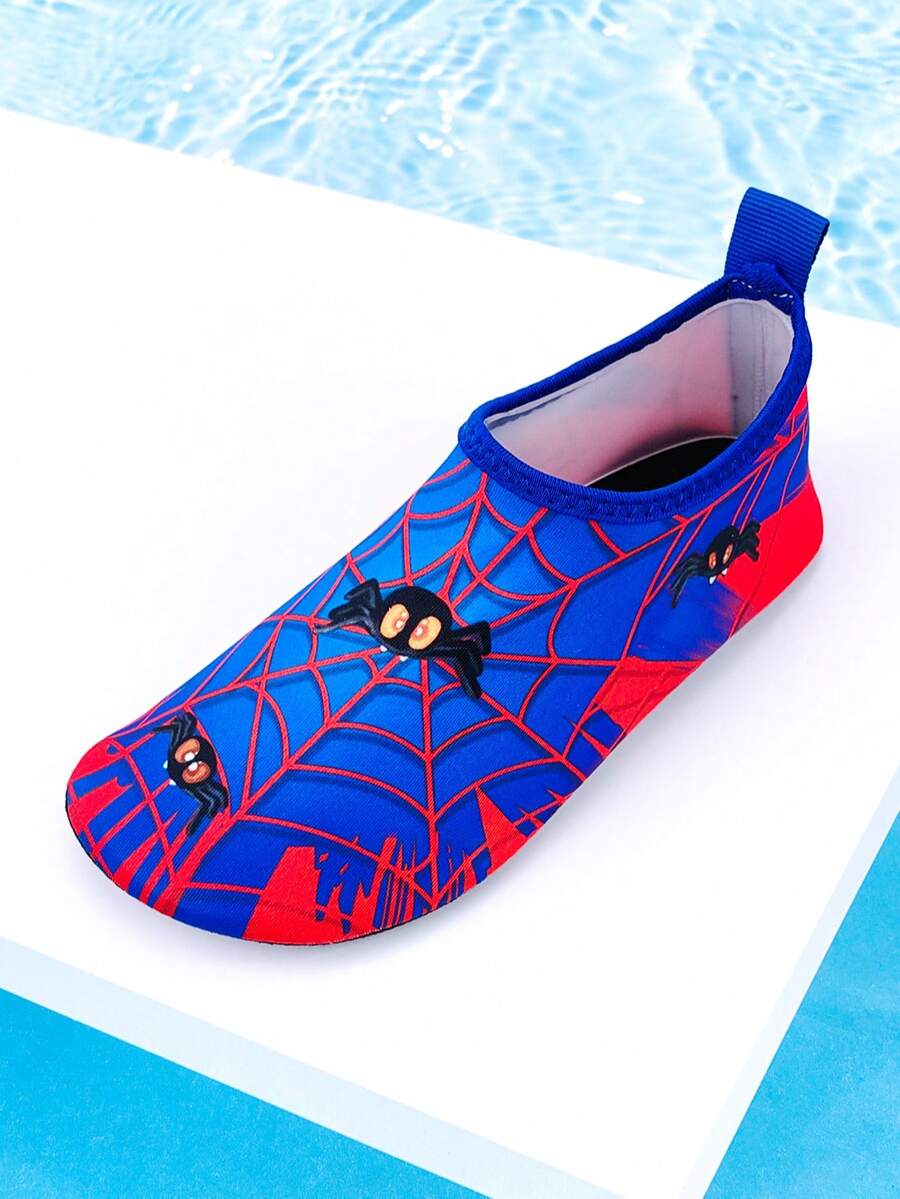 Red slip-on boys water shoes featuring a breathable fabric upper with contrast binding and a durable TPR outsole.