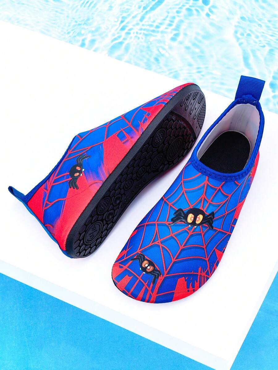 Red slip-on boys water shoes featuring a breathable fabric upper with contrast binding and a durable TPR outsole.