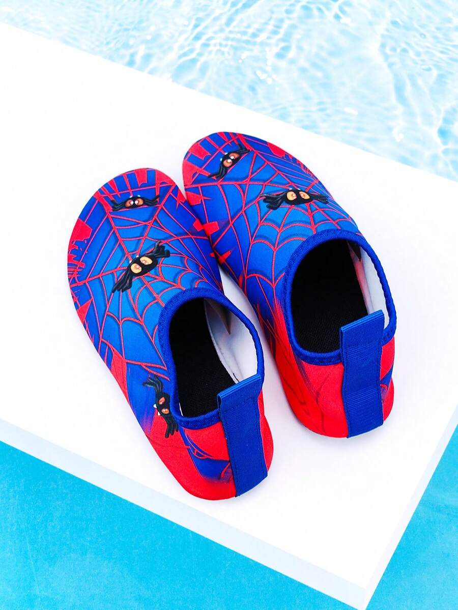 Red slip-on boys water shoes featuring a breathable fabric upper with contrast binding and a durable TPR outsole.