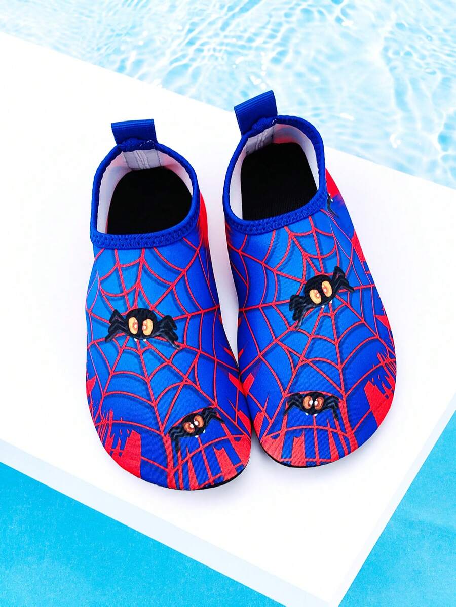 Red slip-on boys water shoes featuring a breathable fabric upper with contrast binding and a durable TPR outsole.