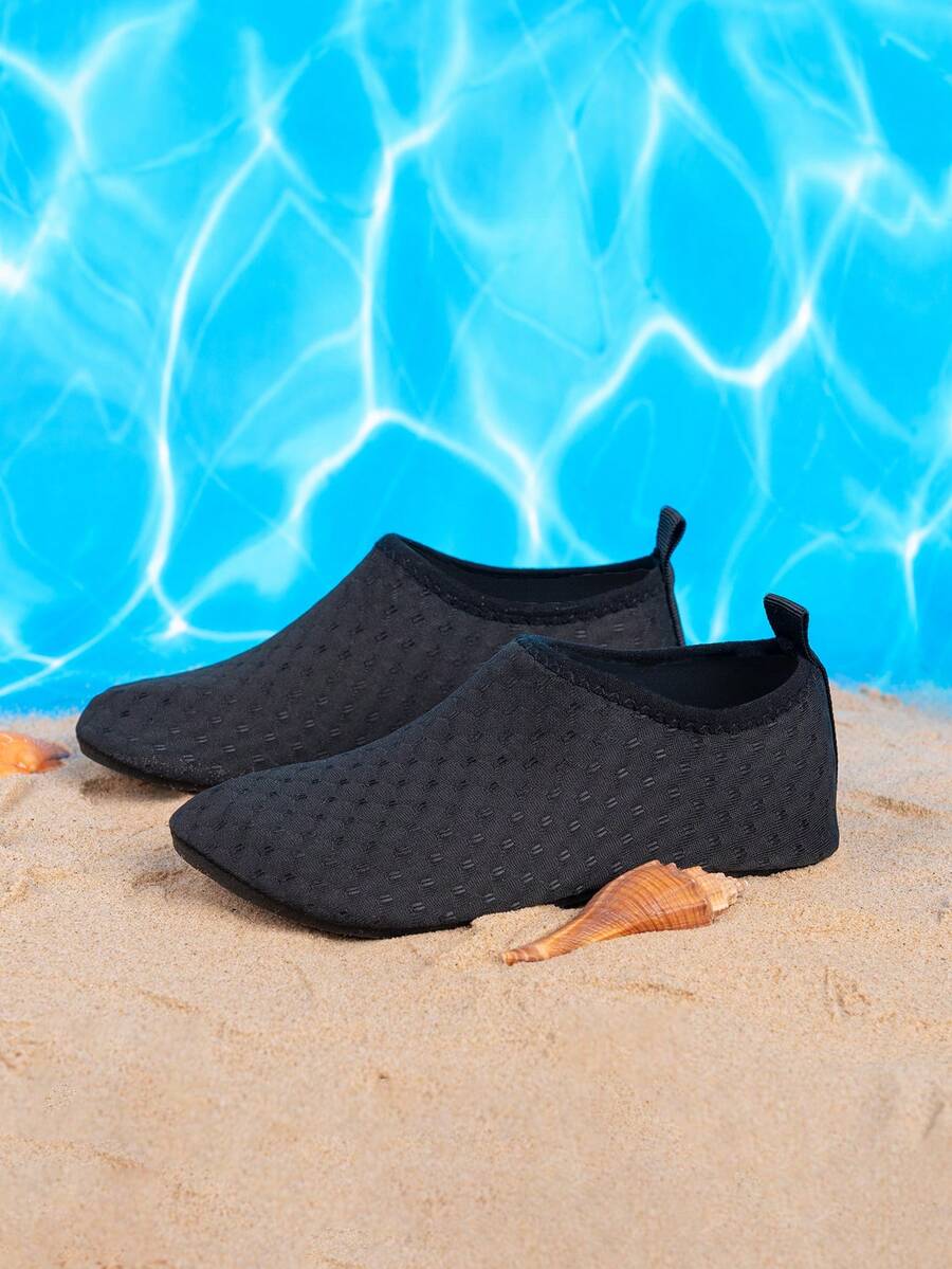 Boys black plain aqua socks featuring a slip-on rib-knit design, breathable fabric upper, mesh insole, and non-slip TPR outsole.