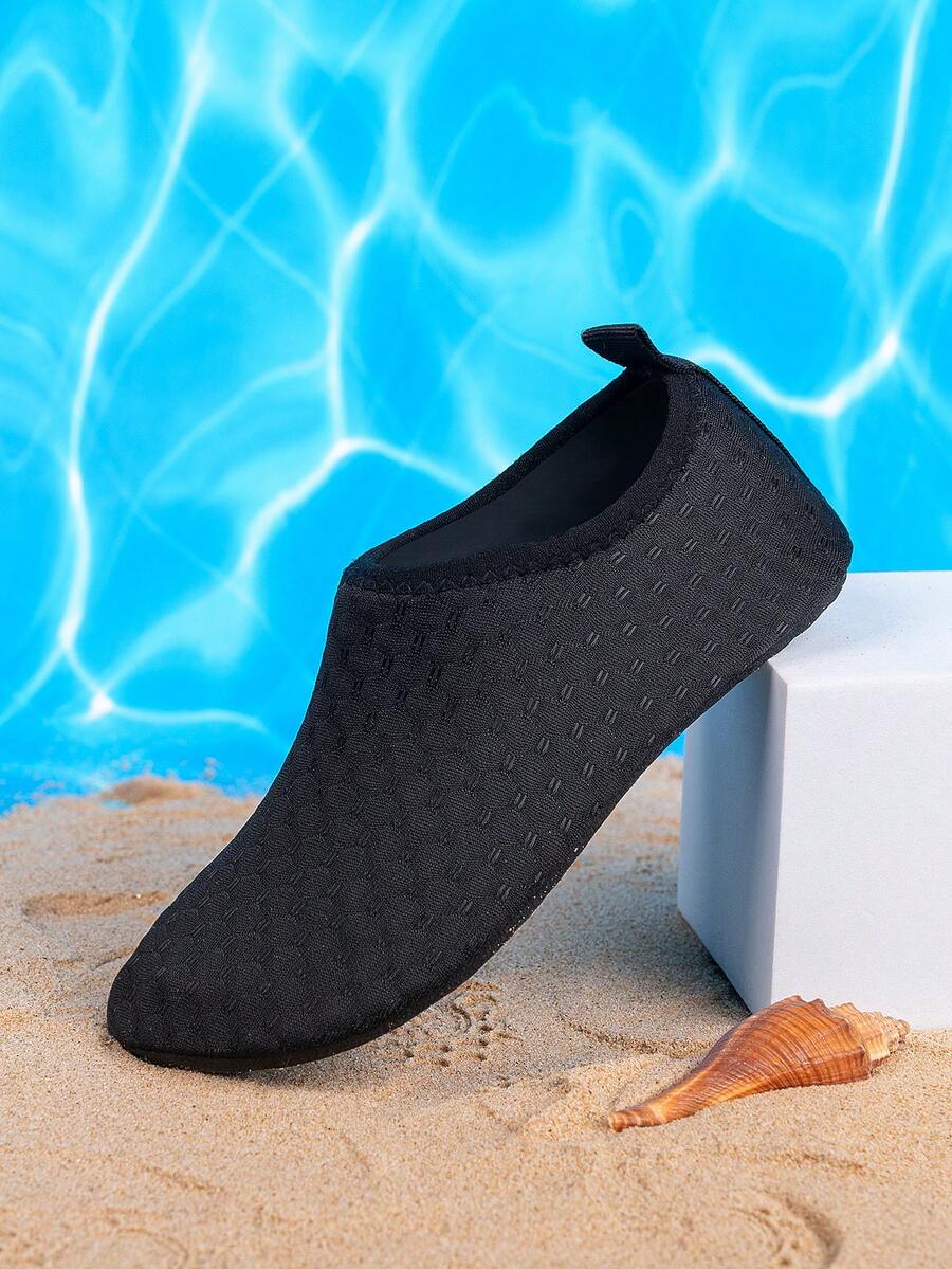 Boys black plain aqua socks featuring a slip-on rib-knit design, breathable fabric upper, mesh insole, and non-slip TPR outsole.