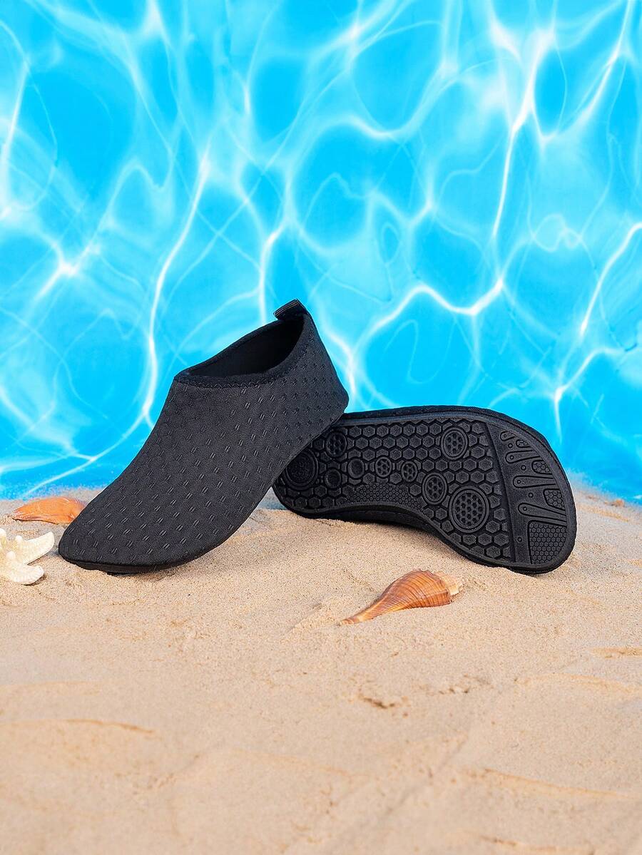 Boys black plain aqua socks featuring a slip-on rib-knit design, breathable fabric upper, mesh insole, and non-slip TPR outsole.