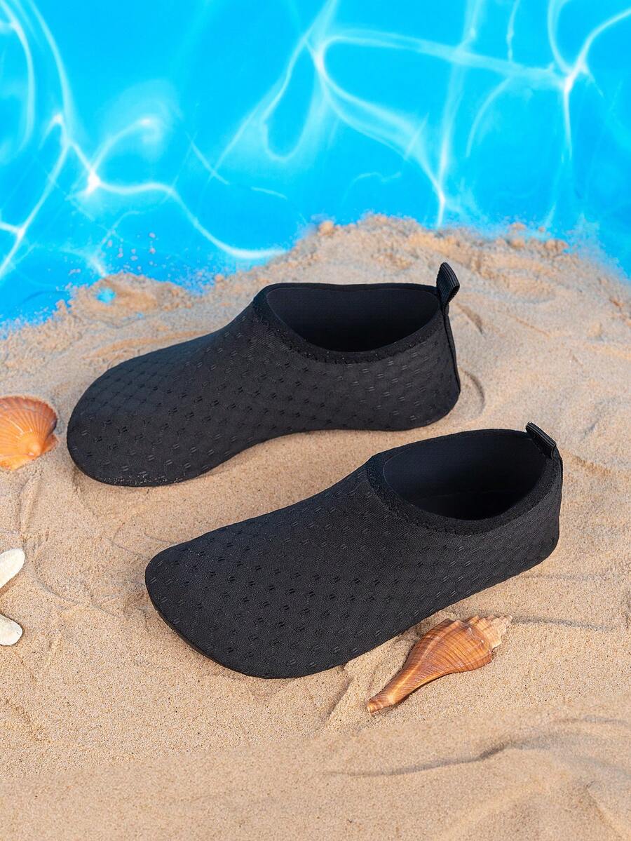 Boys black plain aqua socks featuring a slip-on rib-knit design, breathable fabric upper, mesh insole, and non-slip TPR outsole.