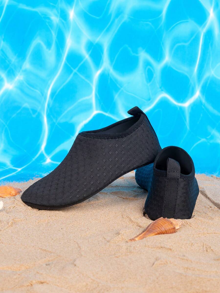 Boys black plain aqua socks featuring a slip-on rib-knit design, breathable fabric upper, mesh insole, and non-slip TPR outsole.