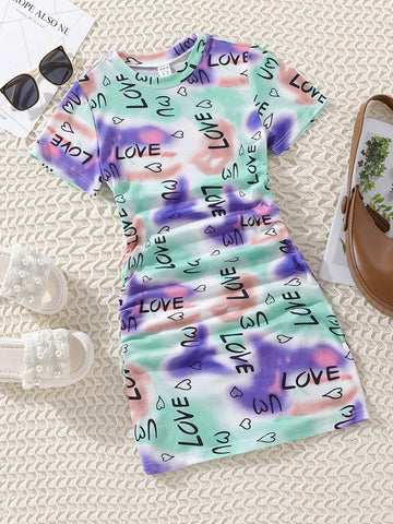 Tween girls multicolor tie dye short sleeve tee mini dress featuring ruched sides, round neck, and slim fit design.