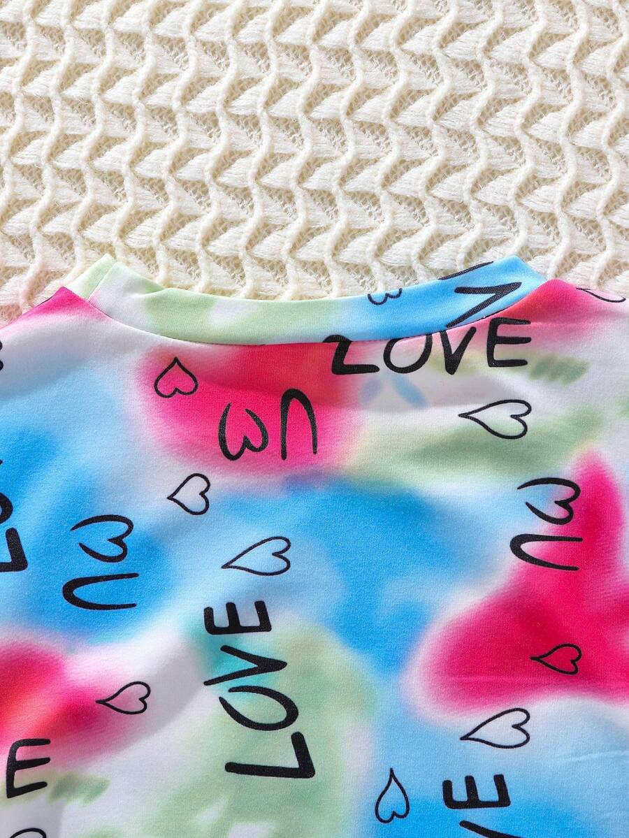 Tween girls multicolor tie dye short sleeve tee mini dress featuring ruched sides, round neck, and slim fit design.