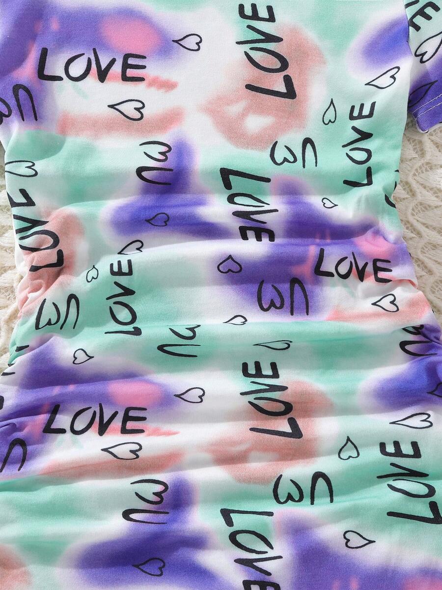 Tween girls multicolor tie dye short sleeve tee mini dress featuring ruched sides, round neck, and slim fit design.
