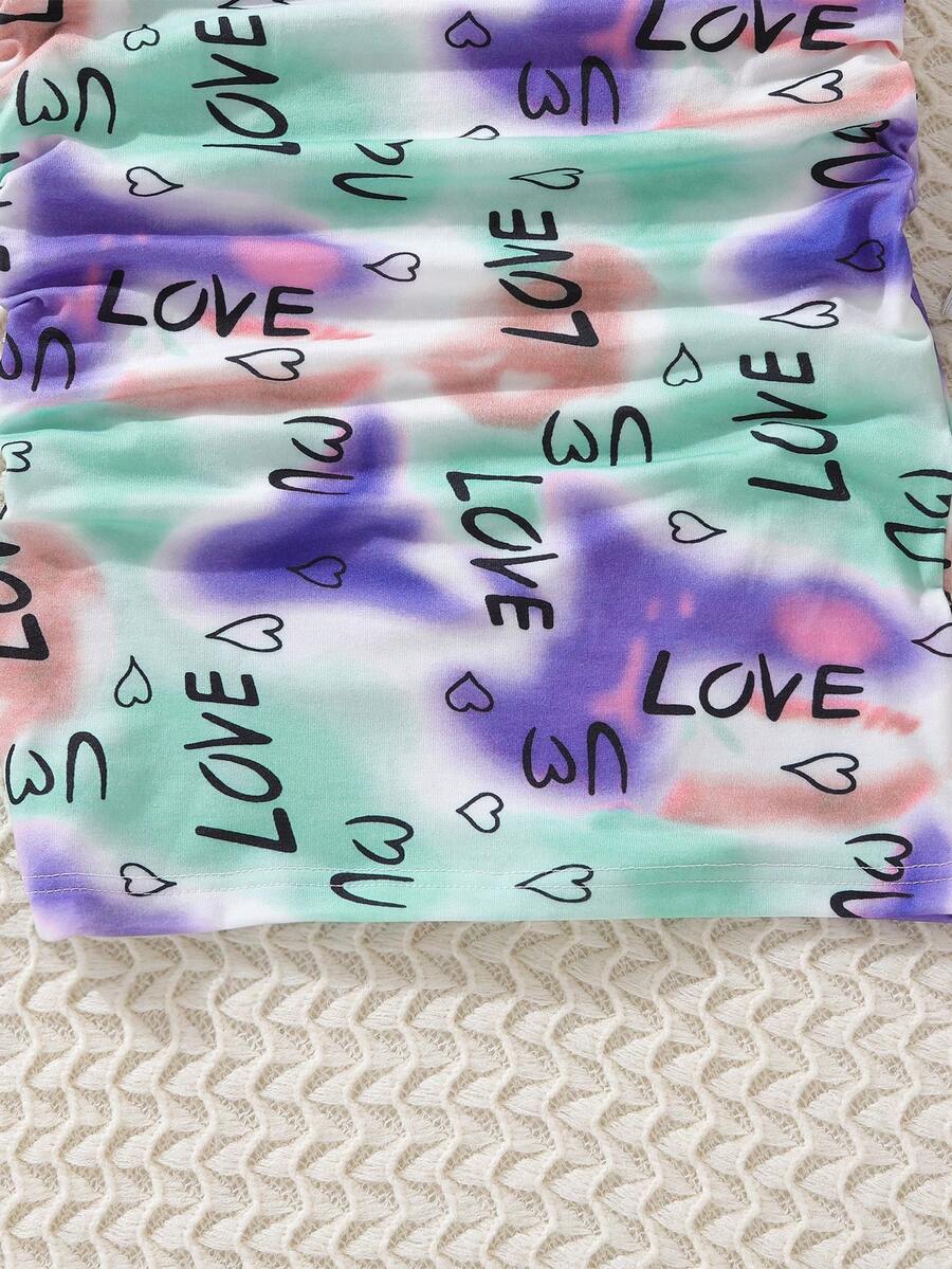 Tween girls multicolor tie dye short sleeve tee mini dress featuring ruched sides, round neck, and slim fit design.