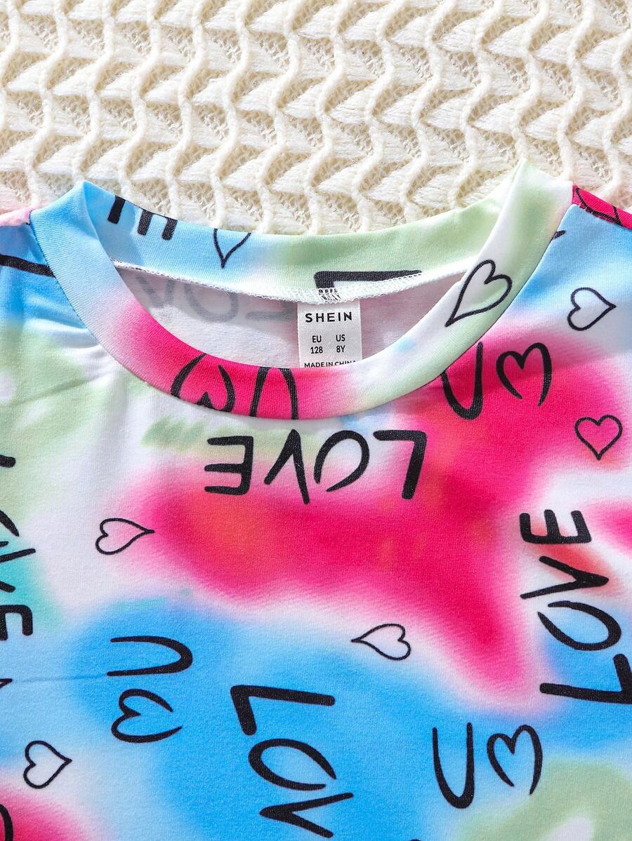 Tween girls multicolor tie dye short sleeve tee mini dress featuring ruched sides, round neck, and slim fit design.