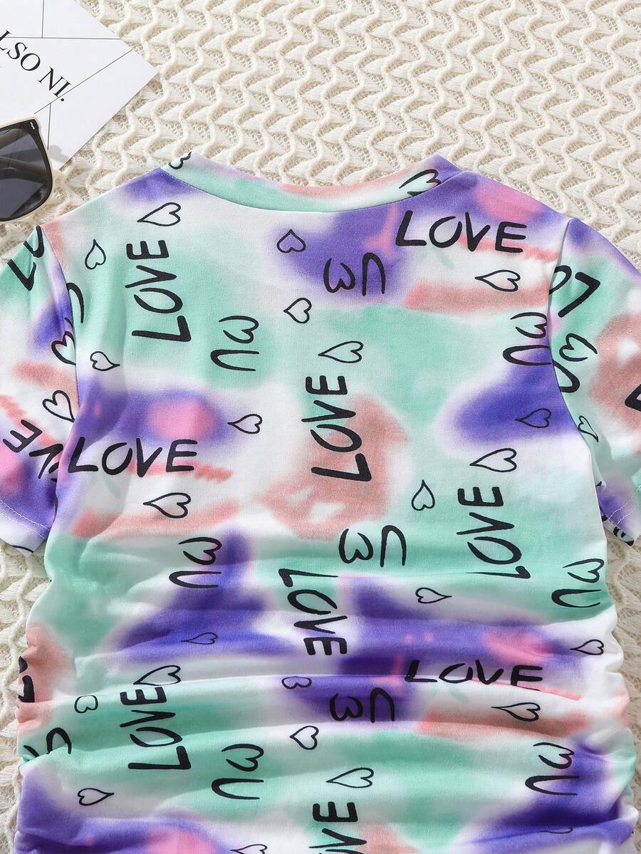 Tween girls multicolor tie dye short sleeve tee mini dress featuring ruched sides, round neck, and slim fit design.