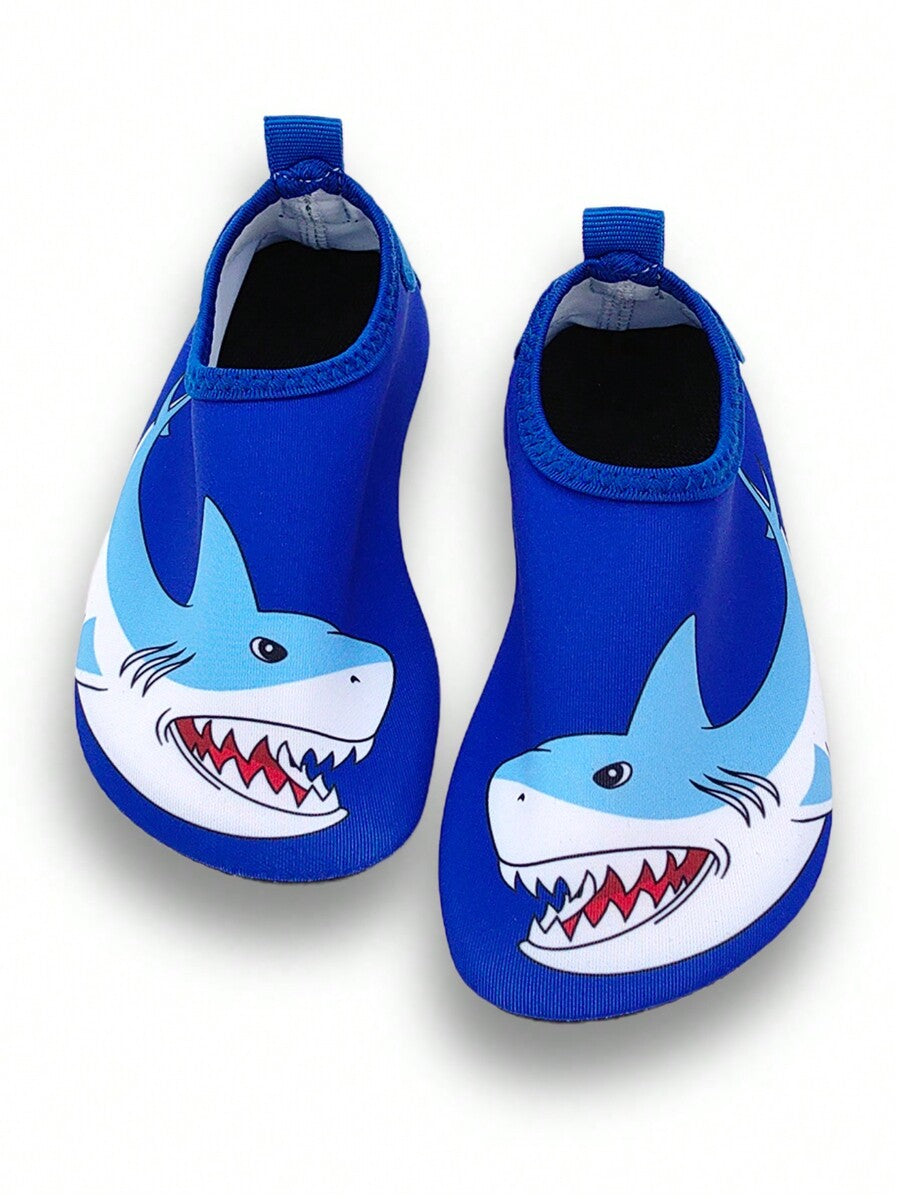 Boys blue shark pattern water shoes with breathable fabric upper and soft bottom TPR outsole.