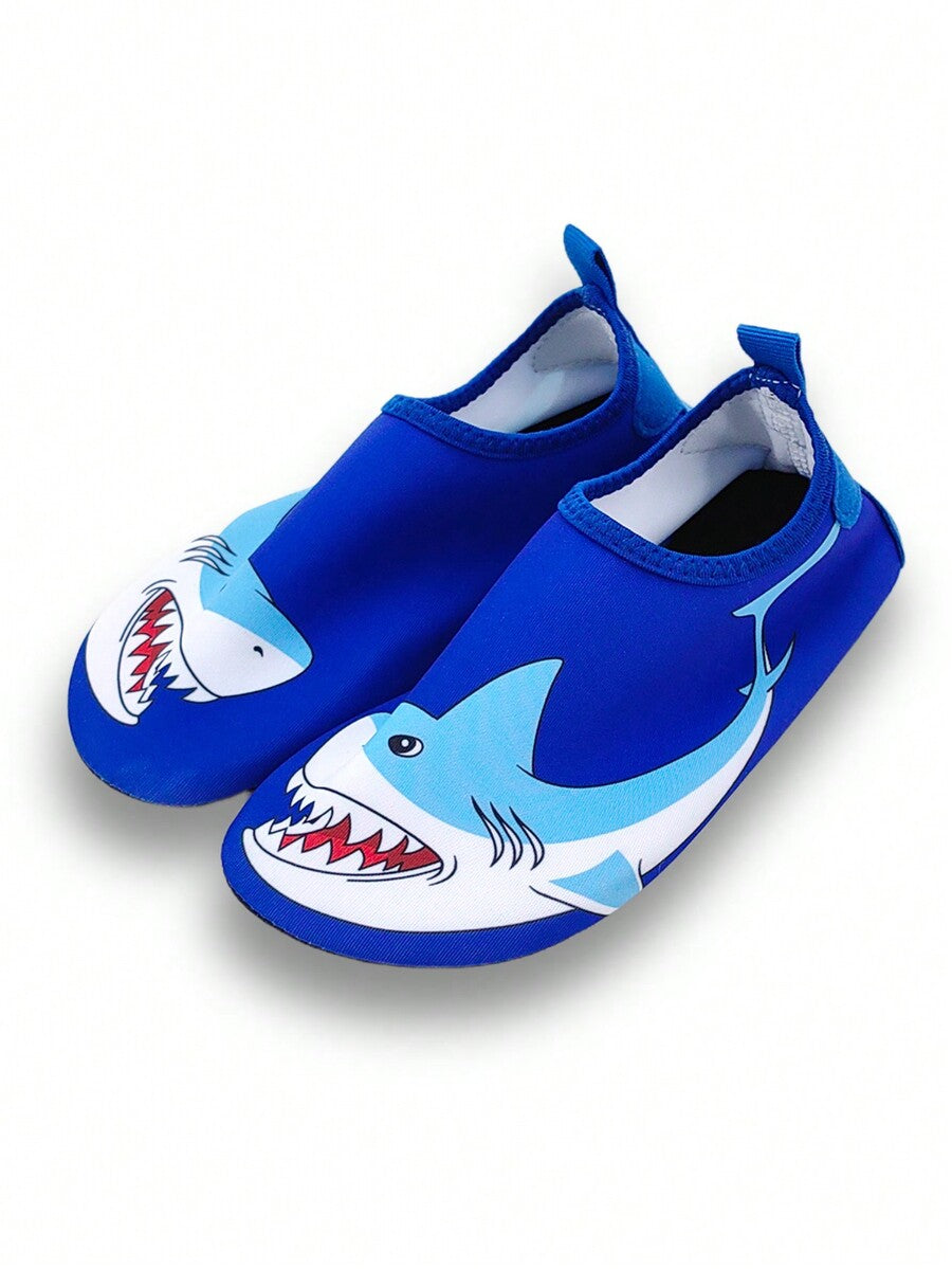 Boys blue shark pattern water shoes with breathable fabric upper and soft bottom TPR outsole.