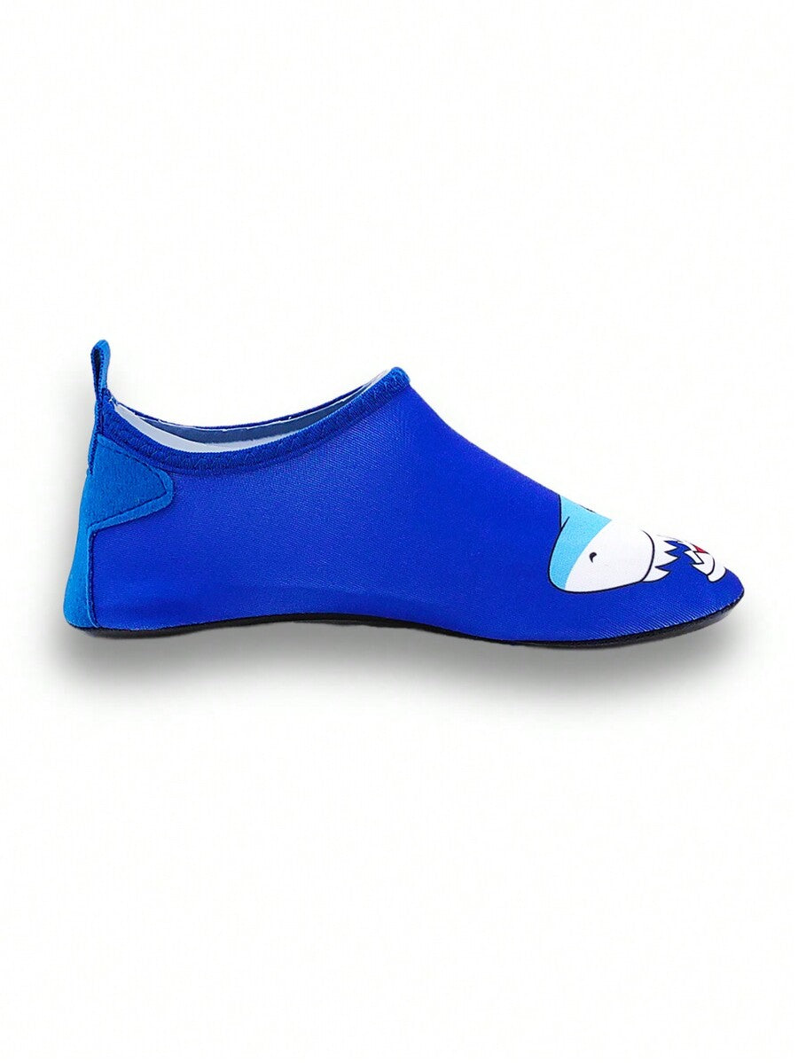 Boys blue shark pattern water shoes with breathable fabric upper and soft bottom TPR outsole.