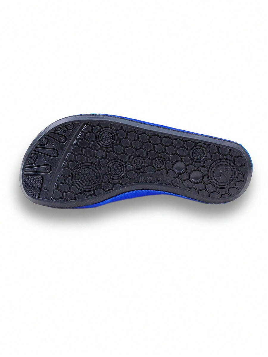 Boys blue shark pattern water shoes with breathable fabric upper and soft bottom TPR outsole.