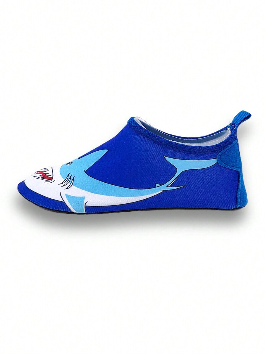 Boys blue shark pattern water shoes with breathable fabric upper and soft bottom TPR outsole.