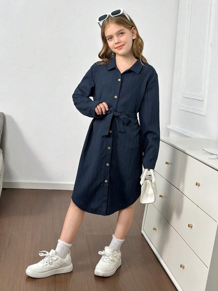 Royal blue tween girls polo collar midi shirt dress with long sleeves, a waist belt, and front button details.