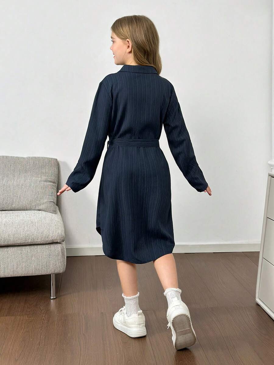 Royal blue tween girls polo collar midi shirt dress with long sleeves, a waist belt, and front button details.