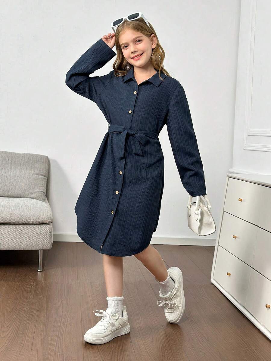 Royal blue tween girls polo collar midi shirt dress with long sleeves, a waist belt, and front button details.