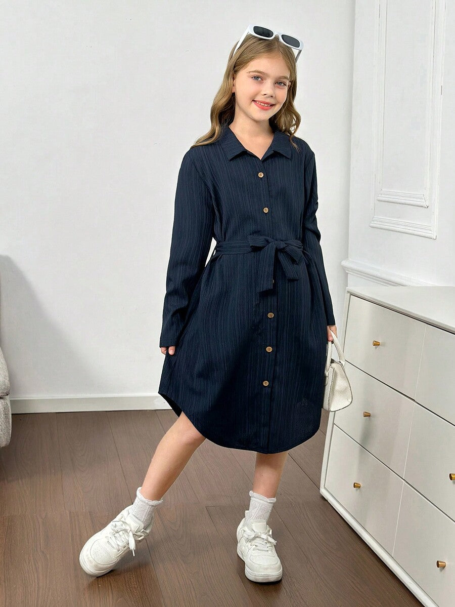Royal blue tween girls polo collar midi shirt dress with long sleeves, a waist belt, and front button details.