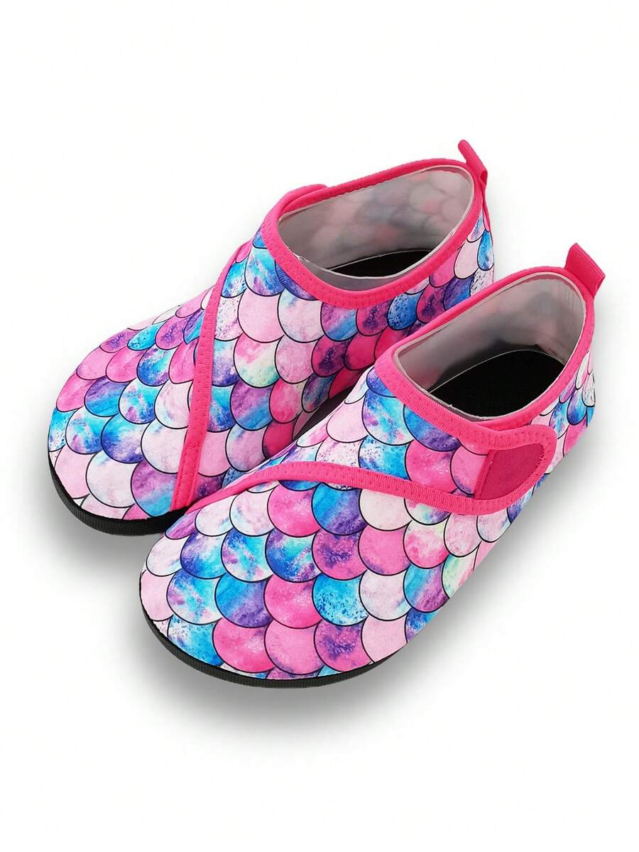 Blue kids water shoes with a shark print pattern, breathable fabric upper, and secure hook and loop closure.