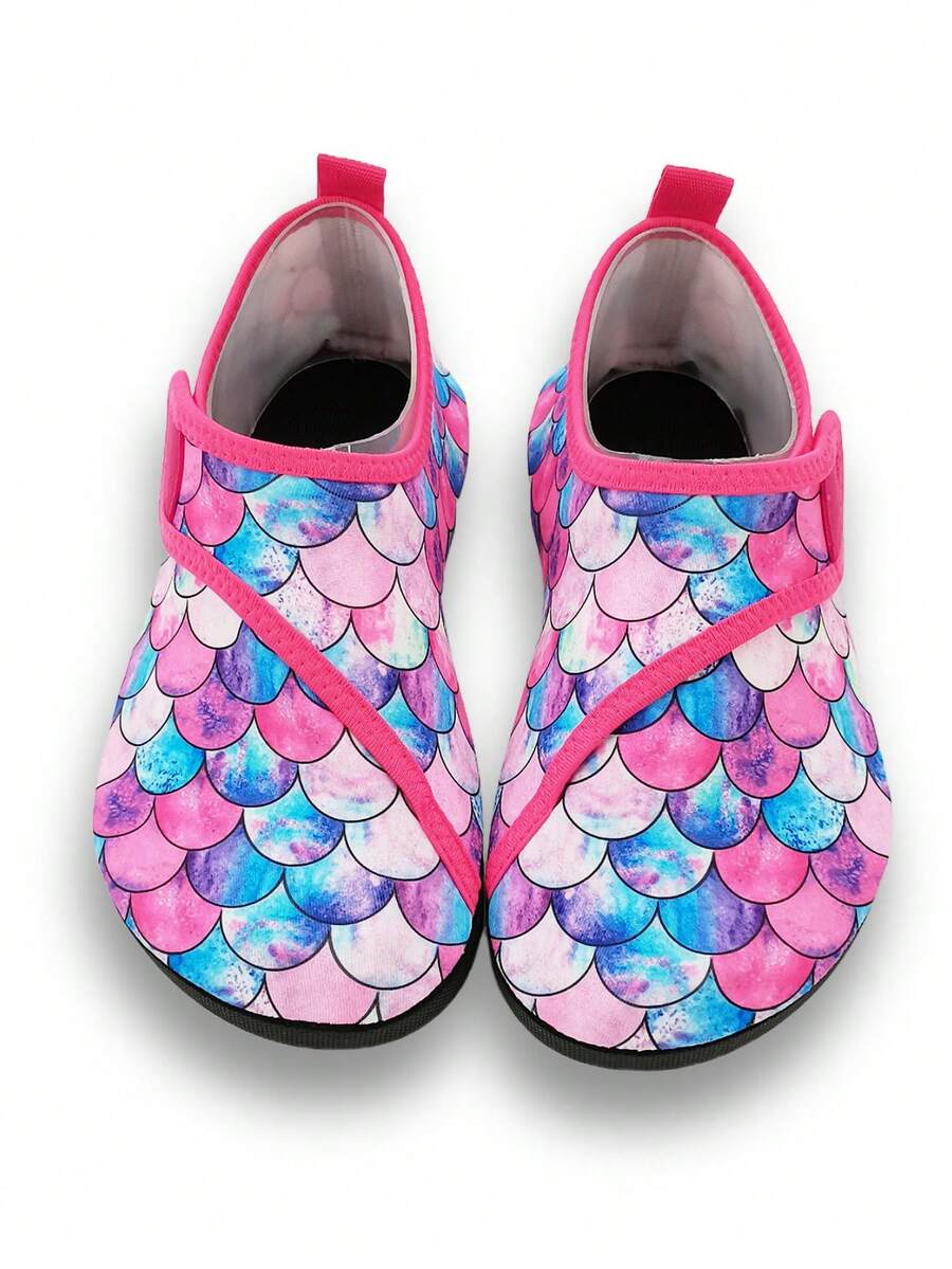 Blue kids water shoes with a shark print pattern, breathable fabric upper, and secure hook and loop closure.
