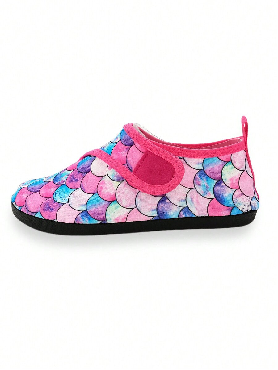Blue kids water shoes with a shark print pattern, breathable fabric upper, and secure hook and loop closure.