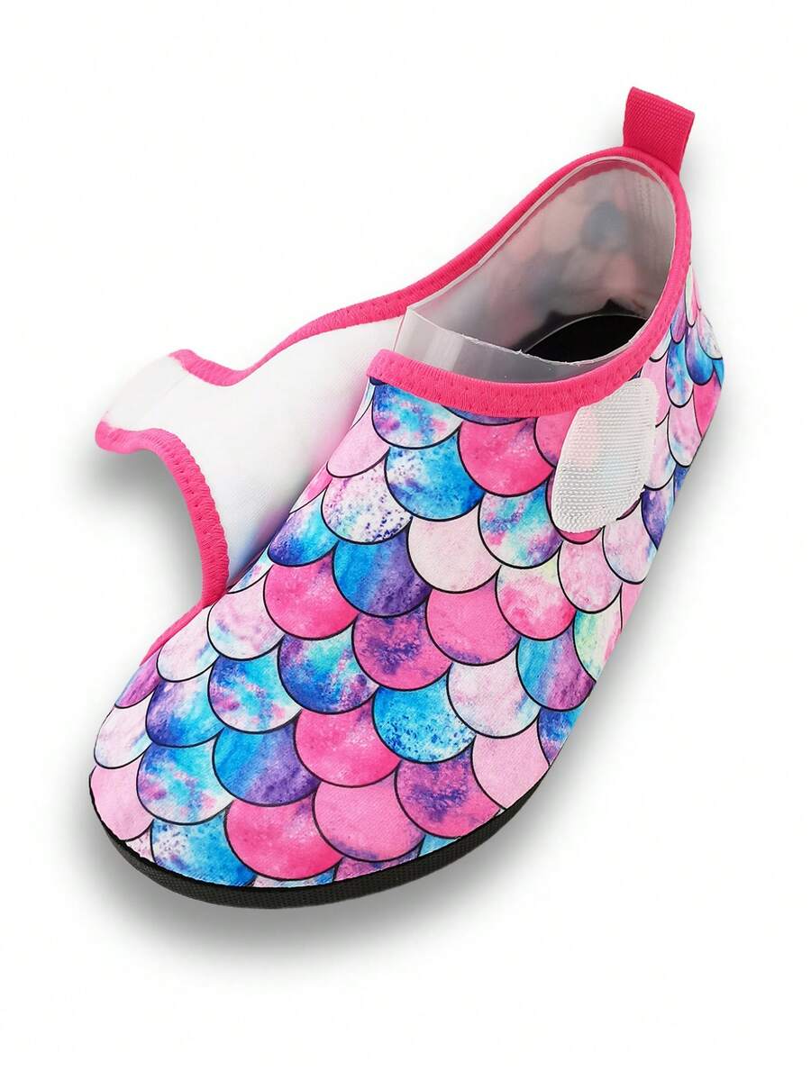 Blue kids water shoes with a shark print pattern, breathable fabric upper, and secure hook and loop closure.