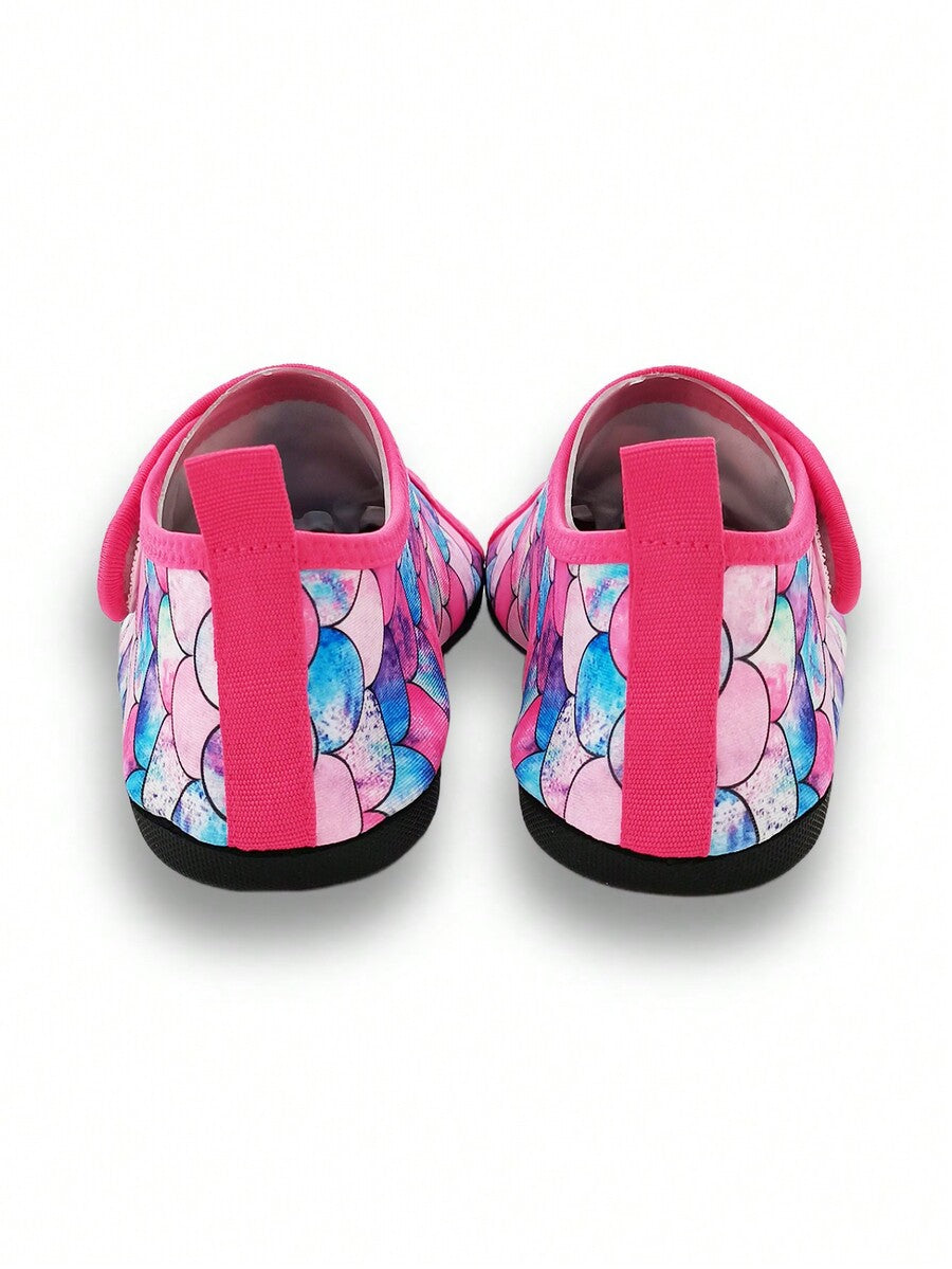 Blue kids water shoes with a shark print pattern, breathable fabric upper, and secure hook and loop closure.