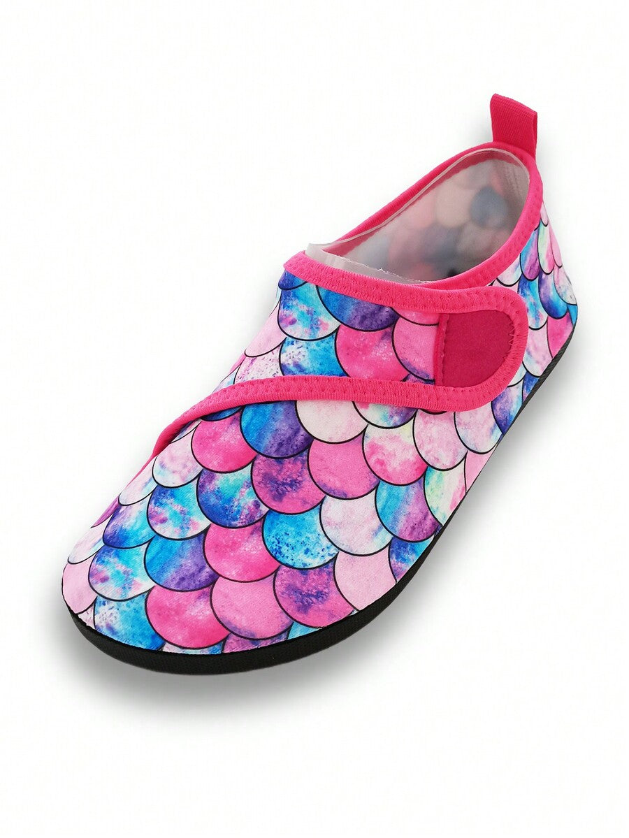 Blue kids water shoes with a shark print pattern, breathable fabric upper, and secure hook and loop closure.