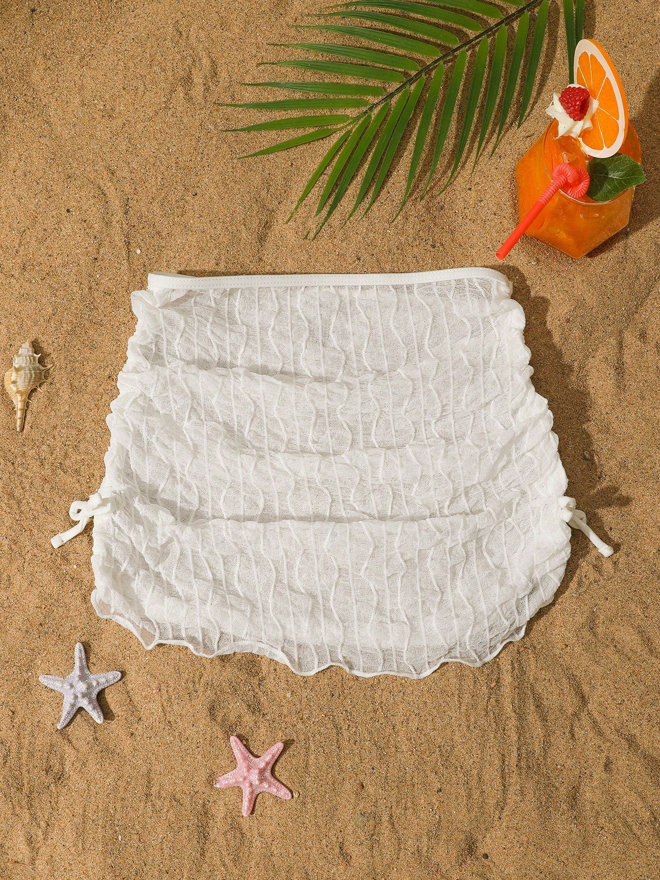White sleeveless mesh drawstring cover-up top for tween girls, semi-sheer short beachwear style for leisure and summer holidays.