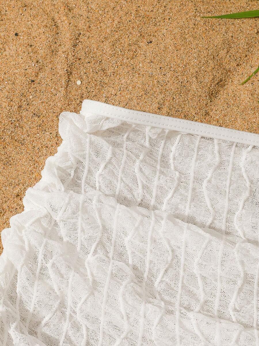 White sleeveless mesh drawstring cover-up top for tween girls, semi-sheer short beachwear style for leisure and summer holidays.