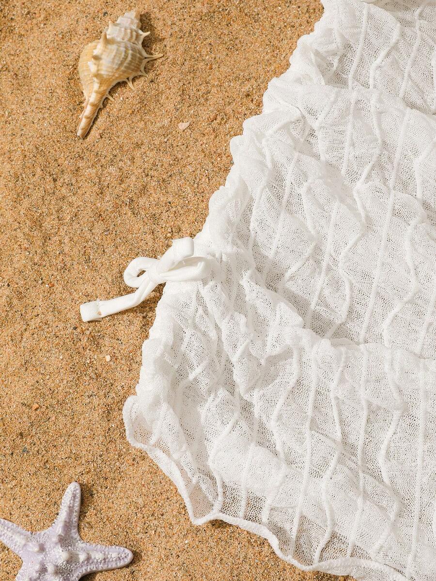 White sleeveless mesh drawstring cover-up top for tween girls, semi-sheer short beachwear style for leisure and summer holidays.