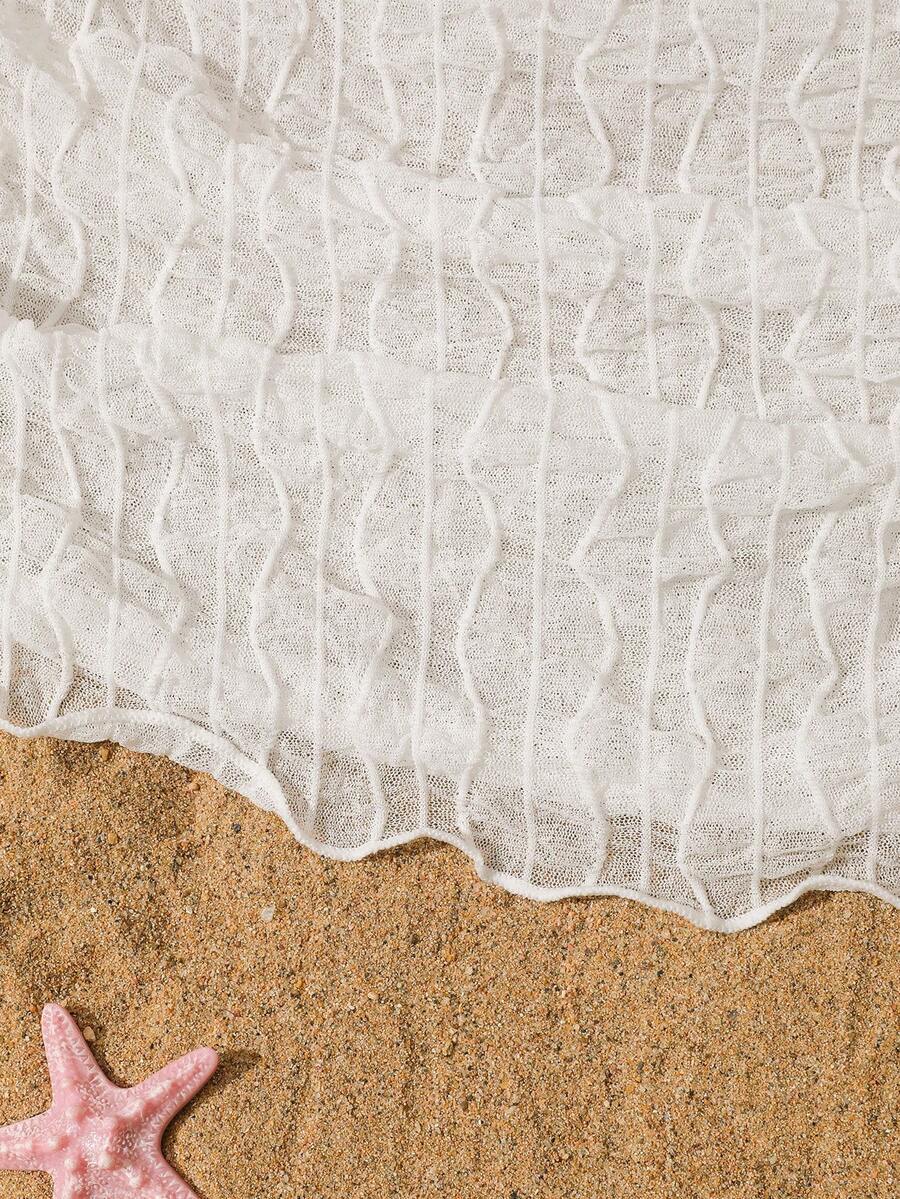 White sleeveless mesh drawstring cover-up top for tween girls, semi-sheer short beachwear style for leisure and summer holidays.