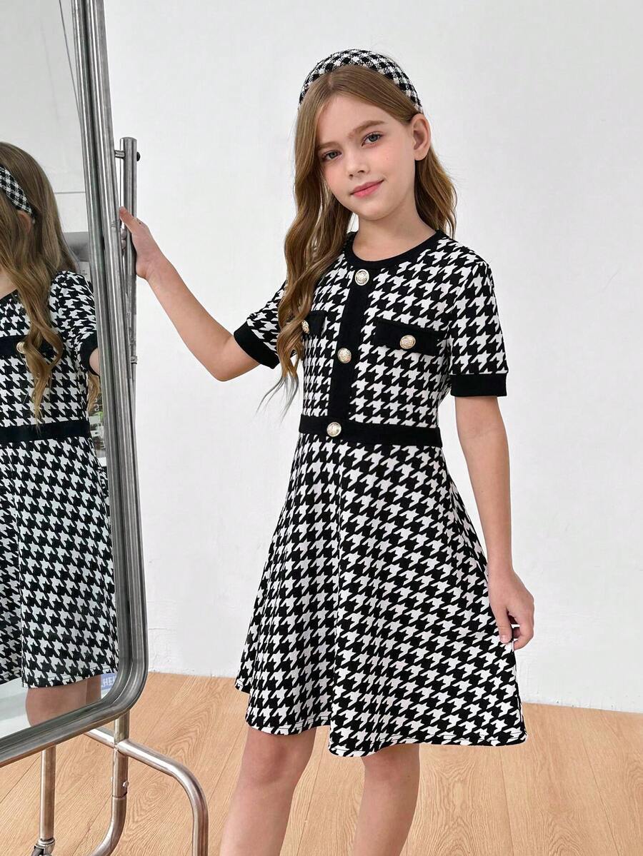 Nova Glow tween girls black and white houndstooth print short sleeve A-line dress with decorative buttons and crew neckline.