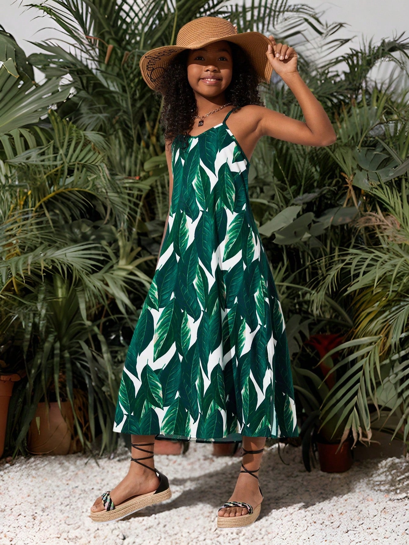 tween girls multicolor all-over printed spaghetti strap boho cami dress with sleeveless design, natural waist, flared hem, and long slim fit silhouette.